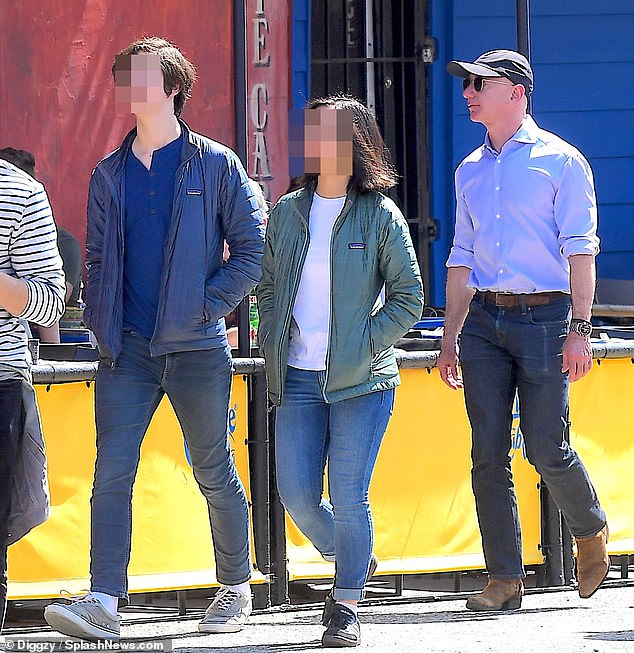 Jeff Bezos walking with his children