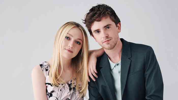 Freddie Highmore with his girlfriend