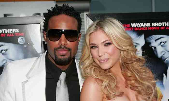 Shawn Wayans with his wife
