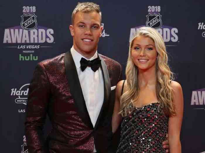 Taylor Hall with his wife 1